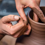 Doug Fitch and Hannah McAndrew making a jug for me